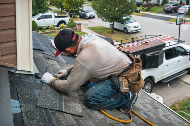 Professional Roof Replacement technician working in Harrisburg, OR